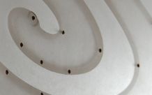 a grey curvature of lines